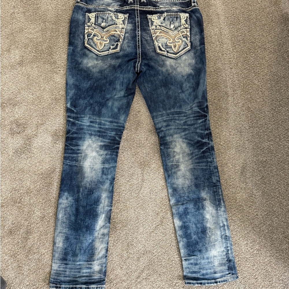 Rock Revival Blue Straight Leg Jeans with Distressed Design
